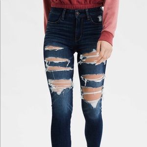 Dark washed super stretch ripped jeans
